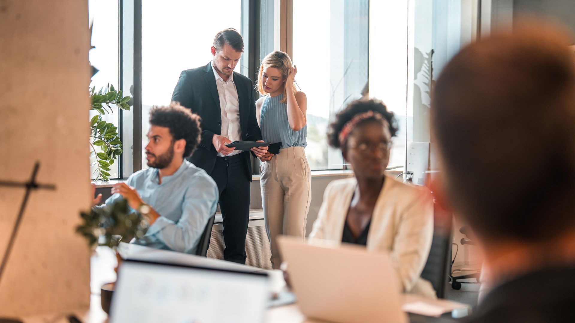 A group of people working in an office.